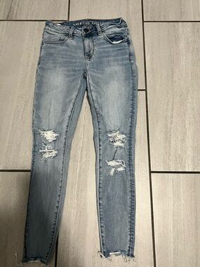 American Eagle Outfitters Light Blue Ripped Skinny Jeans - Women